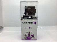 Safari 4K action camera inside waterproof housing displayed on its retail box showing product labeling and specs.