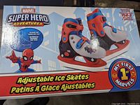 Closed box showing Marvel Super Hero Adventures adjustable ice skates with Spider-Man graphics, model fits kids shoe sizes 7 to 12.5.