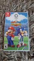 Front view of sealed game case showing Mario, Sonic, and Tokyo 2020 Olympic logo
