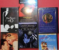 Six drama DVD cases arranged in two rows showing front covers including The Story of O, Woman in the Dunes, Caligula, Crash, Wife, and Mad Hot Ballroom.
