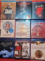 Front view of 9 Blu-ray cases showing titles including Taxi Driver, Star Trek, Apocalypse Now, Carrie, and Blue Velvet