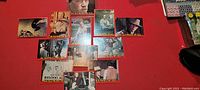Overview photo showing entire set of 14 Kung Fu trading cards arranged on a surface