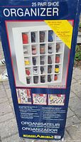 Packaging showing assembled 25 pair shoe organizer in white, with 25 compartments holding shoes.