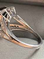 Close-up image showing the inside band marking '925' indicating sterling silver and structural design details.