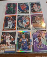 Full 3x3 page layout of nine basketball cards featuring NBA players Durant, Westbrook, Porter Jr., Jackson, Williams, and more with holographic and rare insert designs.