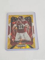 Mac Jones 2021 Panini Prizm All-American Rookie Card in protective sleeve