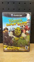 Front cover of Shrek Smash and Crash Racing for Nintendo GameCube showing colorful character artwork and title.