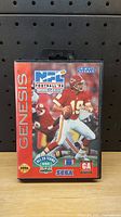 Front of the Sega Genesis NFL Football 94 game cartridge case showing the cover artwork with a football player and branding.