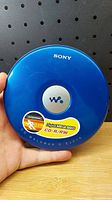 Top view of the blue Sony CD Walkman with logo and Digital Mega Bass, CD-R/RW sticker.