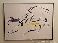 Frontal view of framed lithograph on wall showing overall composition and frame