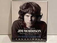 Front cover of boxed audiobook set showing black and white image of Jim Morrison and title text.