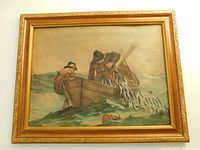 Frontal image of the framed textured canvas showing two fishermen unloading a net full of fish in the sea, framed with a gold and natural wood scrollwork frame.