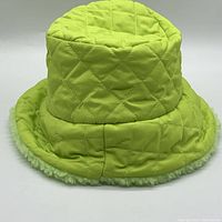 Single green leaf color BP quilted fleece bucket hat with fleece trim on brim edge.