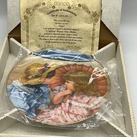 Certificate of Authenticity for 'Summer Secrets' plate by Sandra Kuck, verifies limited edition and authenticity.