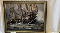 Framed print showing the ship Belem sailing in rough seas, captured in photographic detail.