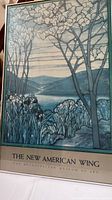 Framed print titled 'The New American Wing' depicting a classic stylized floral and landscape scene in blue tones, framed and in good condition.