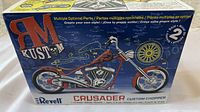 Photo of the Revell Crusader Custom Chopper model kit box front showing the motorcycle artwork and branding.