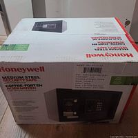 Top and side of sealed box with Honeywell branding, model number and origin details