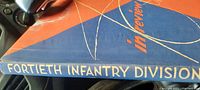 Side view of the book spine showing title 'Fortieth Infantry Division'