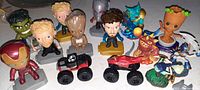 Front angle view of all figures and vehicles displaying characters and vehicles clearly.