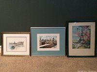 Photo showing all three framed art prints side by side, illustrating size and frame styles.