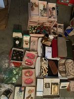 Overhead view showing jewelry organizer, wallets, fragrance and sample vials