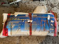 Box of King Canada drywall and panel lift with visible brand and model information.
