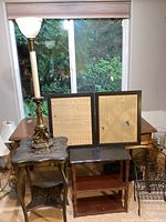 Overall view of the lot showing lamp, table, bookshelf, bulletin boards and magazine rack