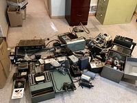 Floor view of all items arranged, capturing overall lot