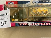 Packaged die-cast tractor-trailer collectible featuring Green Bay Packers graphics and NFL logo.