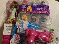 Lot with Barbie doll, Disney Princess Necklace Activity set and Unicorn Popper toy new in packaging