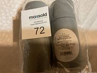 Salt shaker and pepper grinder set wrapped in plastic, label visible with brand Tabletshield and origin China.