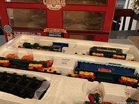 Full view of train set in original styrofoam packaging with box backdrop