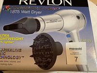 Photo of the Revlon 1875 watt hair dryer box showing product image and packaging condition.