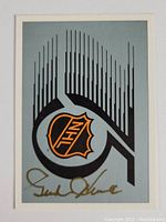 Front side of the Ultimate Trading Company hockey card signed by Gordie Howe featuring NHL logo.