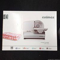 Box showing Cusimax Food Slicer CMFS-200 with product image and branding.