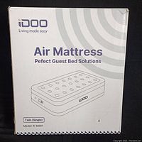 Box of iDOO Twin (Single) Air Mattress Model R-M001 with packaging showing the product illustration and branding.
