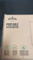 Box front showing Hike Crew logo and features: portable water heater, lightweight for travel, heats water to 125°F, perfect for camping, hunting, and fishing trips.