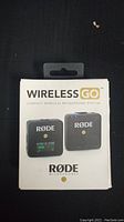 Front of Rode Wireless GO compact wireless microphone system box showing receiver and transmitter images and product name.