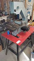 Front view of Delta band saw mounted on stand