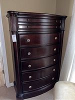 Full front view of dresser showing overall shape, finish, and drawer alignment
