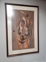 Frontal view of framed abstract painting