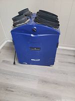 Blue Venmar HEPA 3000 air purifier unit photographed from front, showing top duct connections and front panel