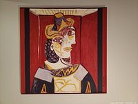 Full view of the Picasso silk print with red, black, yellow and white abstract portrait