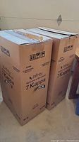 Two Infinity 7 Kappa original shipping boxes side by side