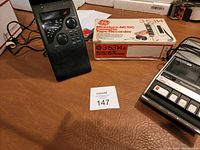GE Miniature AC/DC Cassette Tape Recorder with original box and Panasonic tape recorder visible
