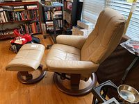 Recliner chair and ottoman displayed in room