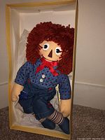 Raggedy Andy doll in box with detailed yarn hair and cloth clothing