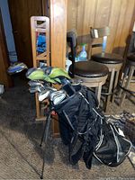 Full view of the golf club set in the Lift Grip black stand bag with legs extended