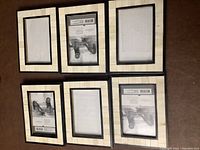 View of six matching 4x6 inch picture frames arranged in two rows of three, showing front side with inserts and frame design.